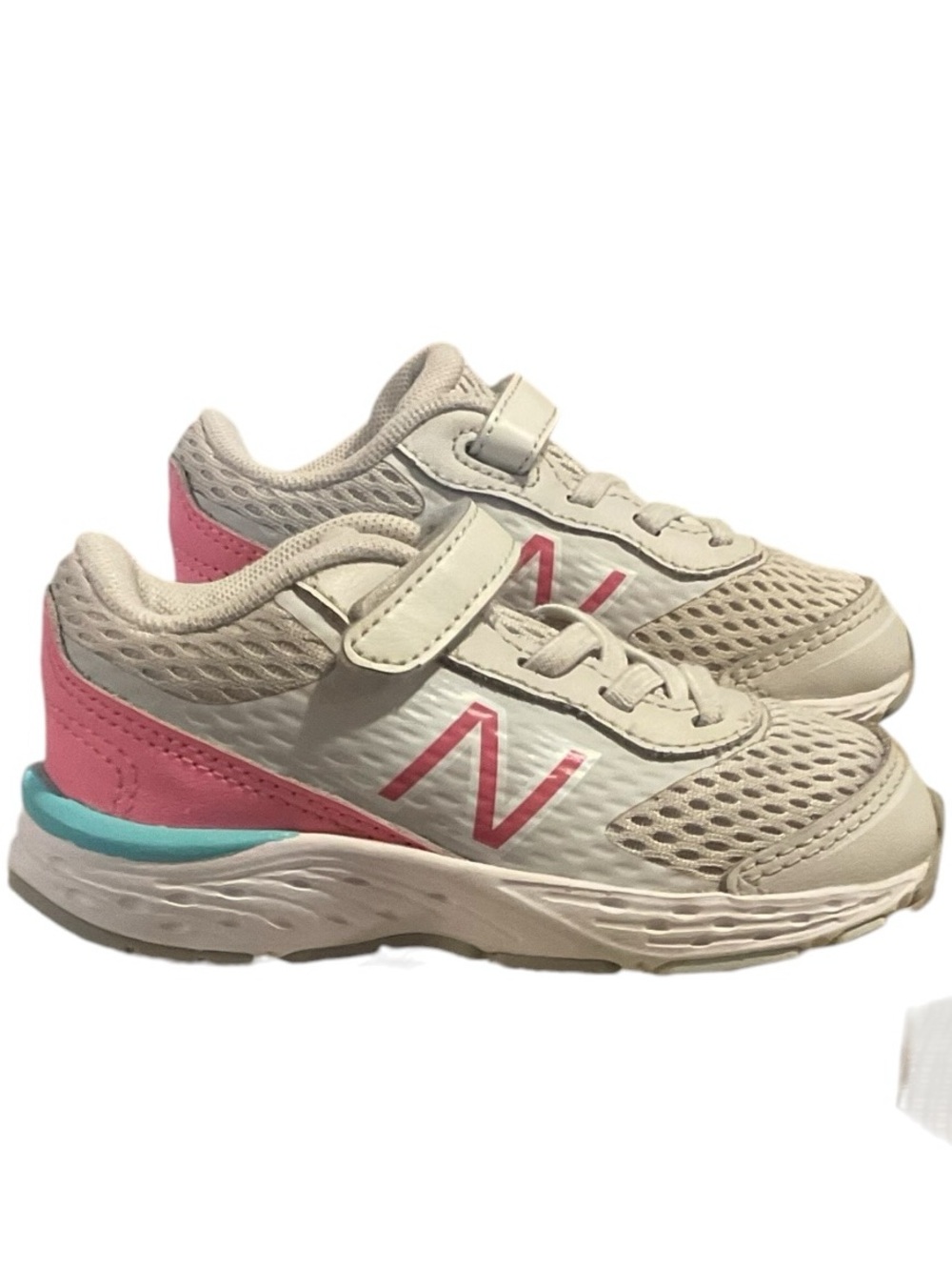 New Balance Kids Beige Sneakers with Pink and Teal Accents